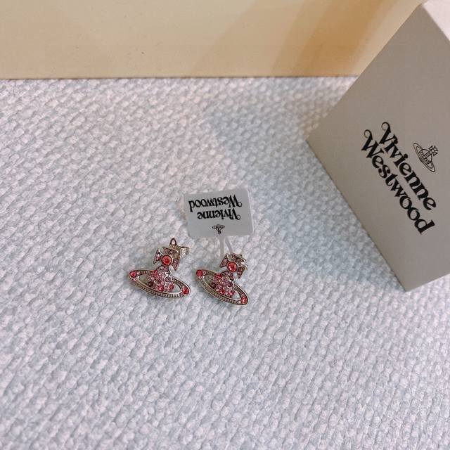 Vivienne Westwood Earrings. Known as "The Queen Mother" by fans in China and kno