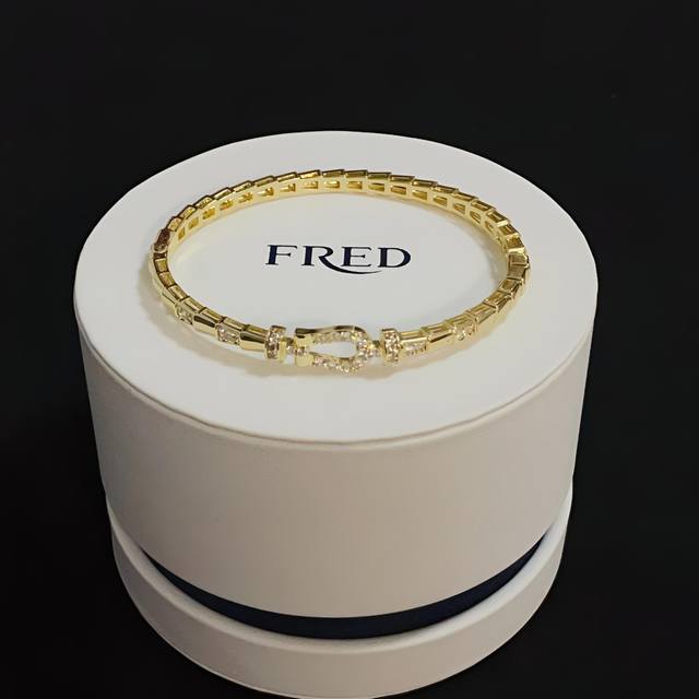 The popular Fred full diamond horseshoe buckle bracelet and strap is a classic