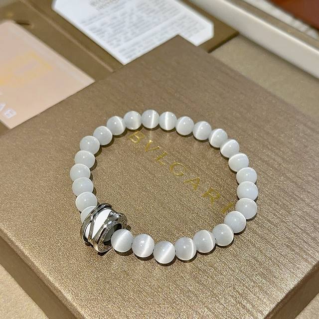 Bulgari bracelet, made of V-gold, features natural cat's eye stones from the Bvl