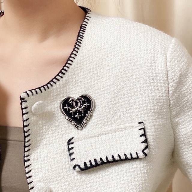 Chanel's new diamond-studded brooch is a truly feminine accessory. Women who ded