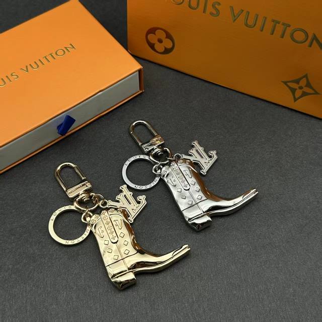 LV Louis Vuitton cowboy boot keychain, available in gold and silver! Exquisite m