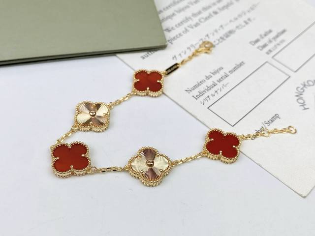 Vca Van Cleef & Arpels' four-leaf clover and five-flower bracelet features a uni