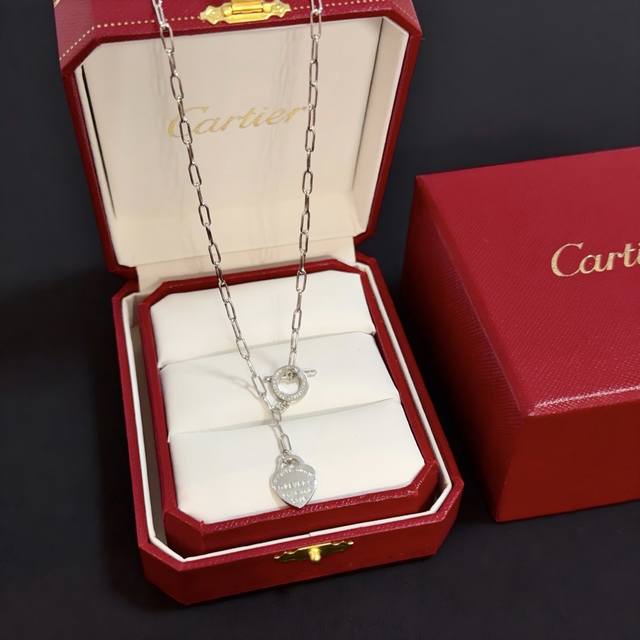 Cartier's high-end custom-made heart necklace features diamond-studded V-gold,
