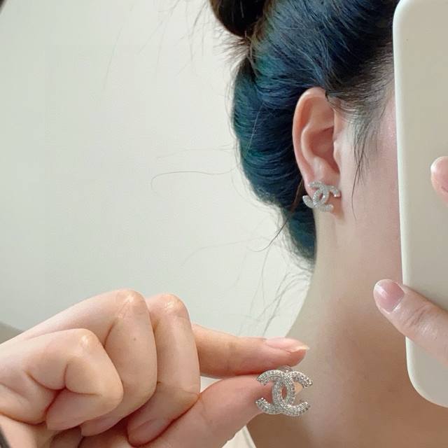 New Chanel diamond-studded earrings in a Chanel style. Exactly the same origina