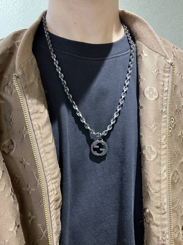 New product release: The latest model of this handsome Gucci necklace, a higher