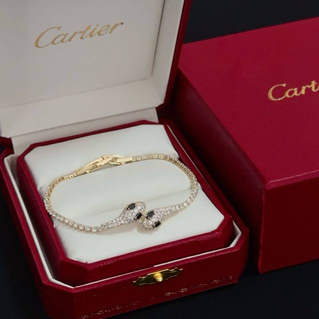 Cartier's high-end custom diamond-encrusted heart bracelet features a classic ye