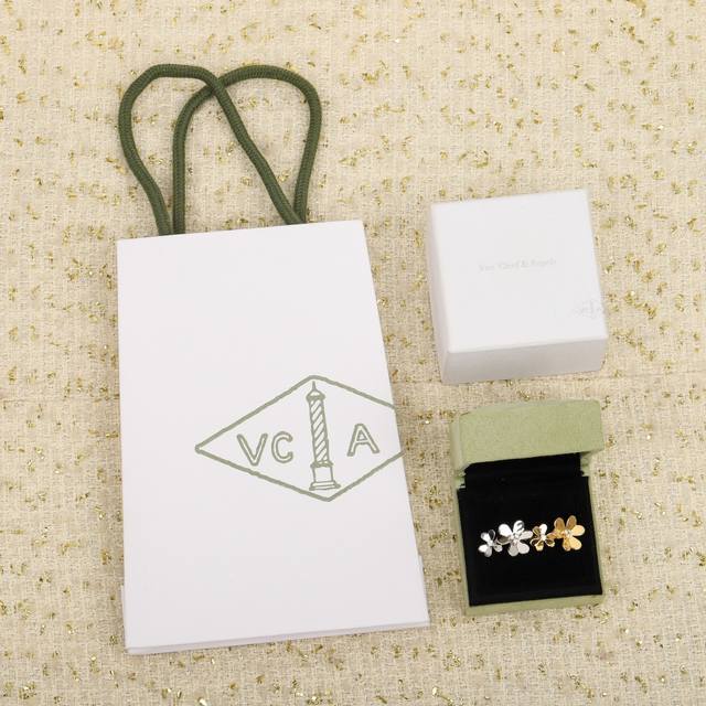 205380 Our clover open ring is priced at over 60,000. Custom 18K gold and diamon