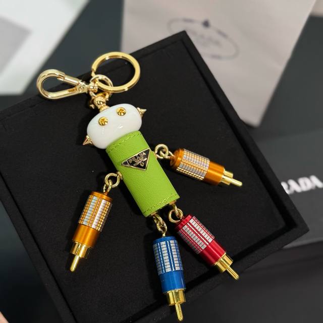 Prada robot keychain pendant bag pendant - This handbag charm is made of metal a
