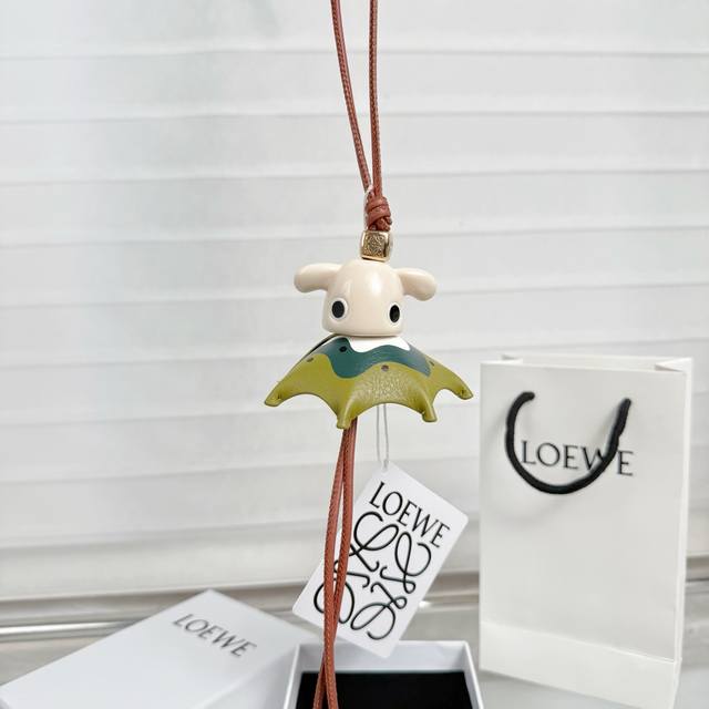New arrival: Loewe Puzzle Archie Pendant. Colors: White and Dark Green. This co