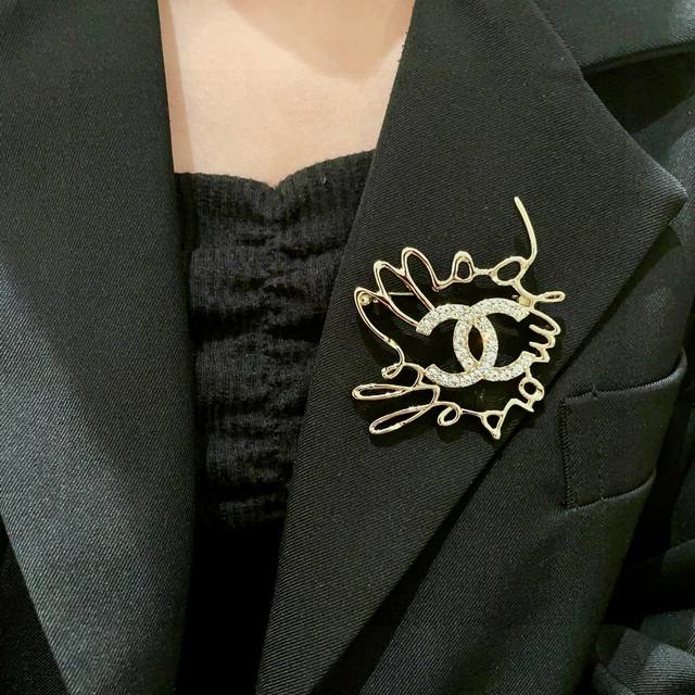 Chanel double C diamond brooch.