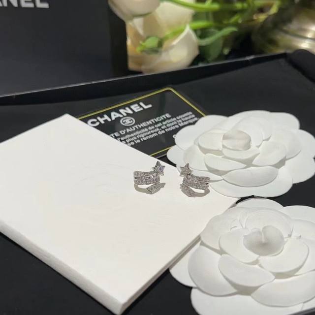 Seiko version of Chanel's new crystal diamond comet earrings with original logo