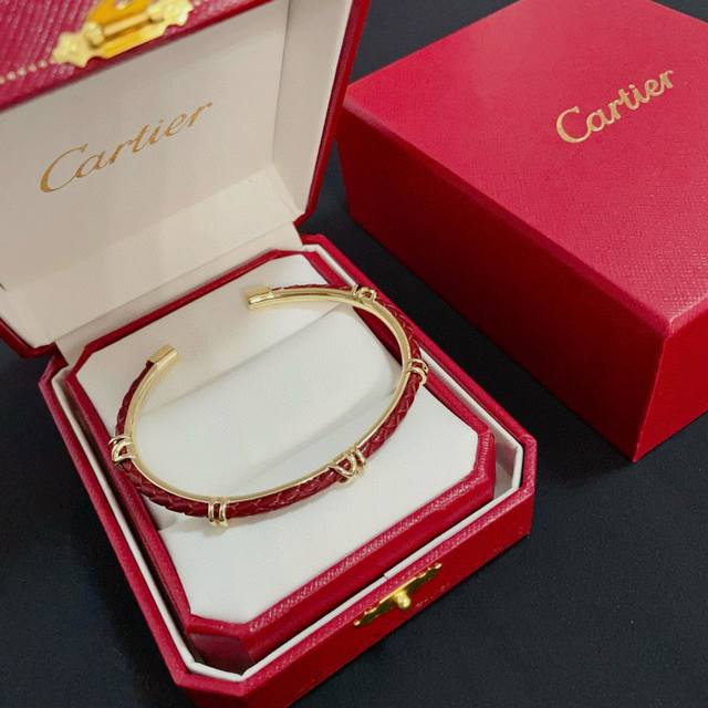 A red Cartier bamboo bracelet, a hit on Douyin and Xiaohongshu, featuring a high