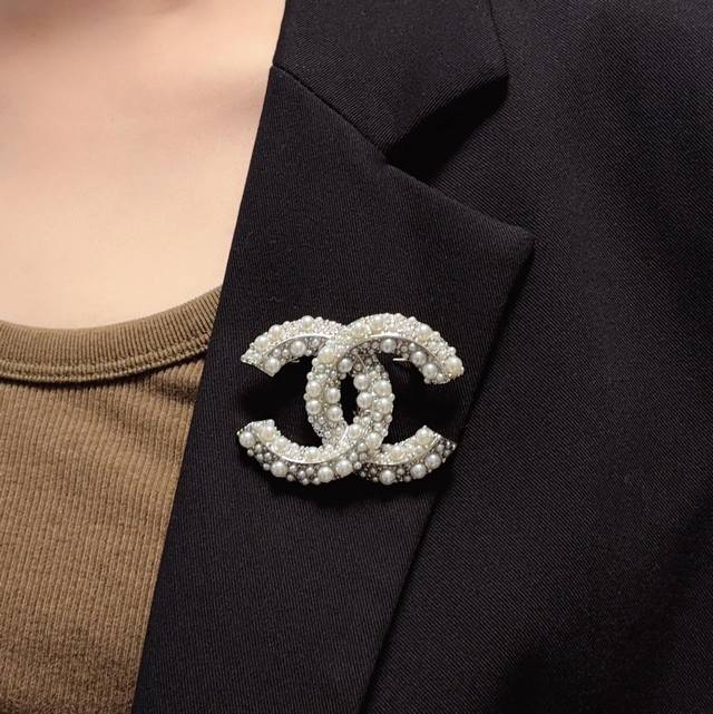 Chanel's new silver pearl and small bead brooch is now available at Chanel's bou