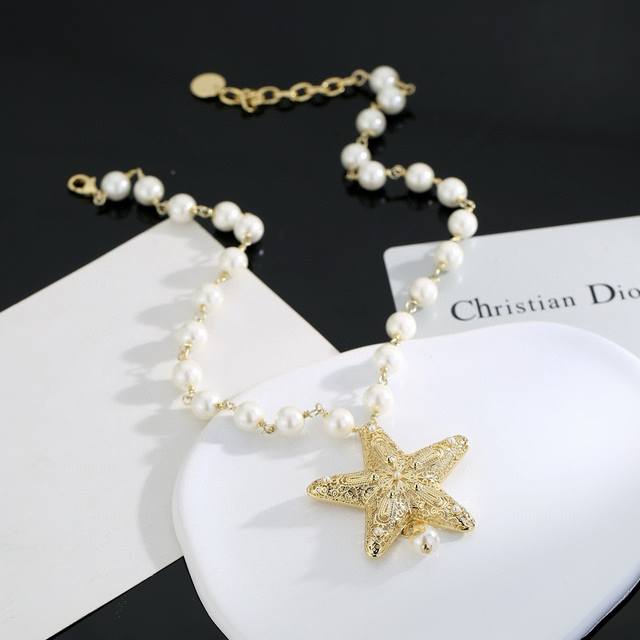 Dior's Ocean Series pearl and starfish necklace, a favorite among top brands, fe