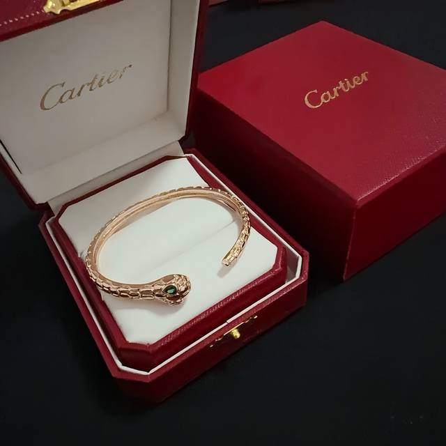 Cartier's diamond-encrusted snakehead bracelet, a high-end custom version, feat