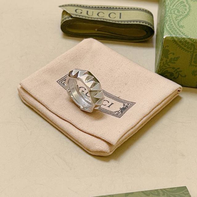 The latest and most upscale Gucci ring, the Anger Forest series double G, featur