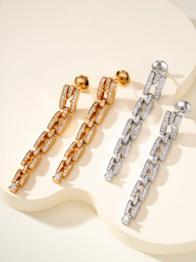 The B.Zero1 collection's long, full-diamond earrings combine bold, flowing curv