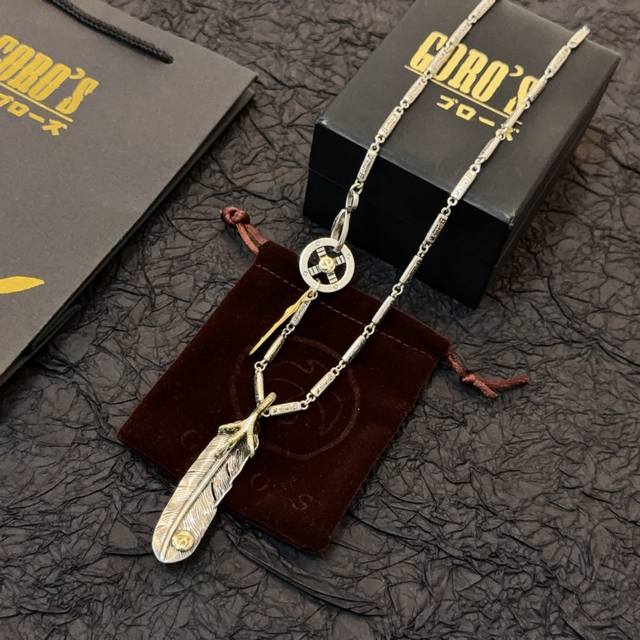 New arrival: Goro's Takahashi Goro Eagle Claw Feather Necklace, a top-tier edit