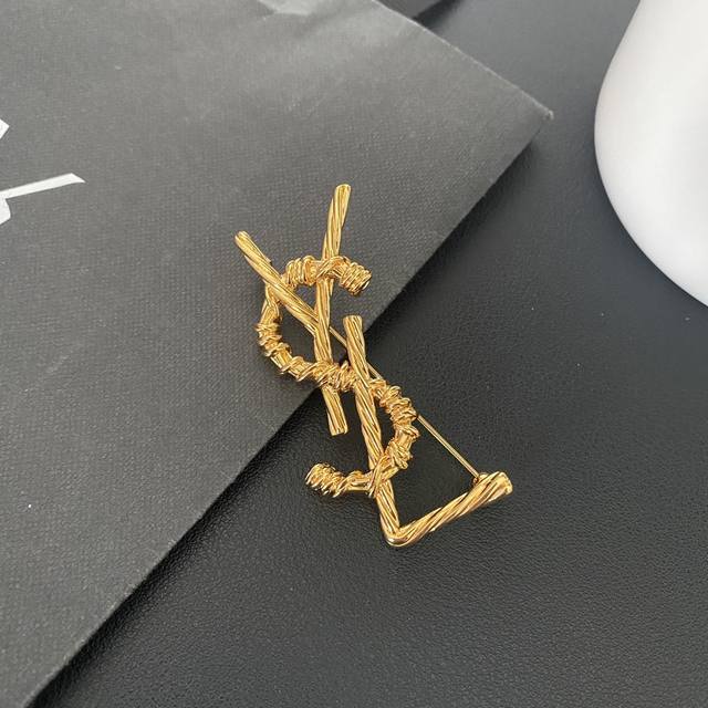 Saint Laurent simple line letter brooch