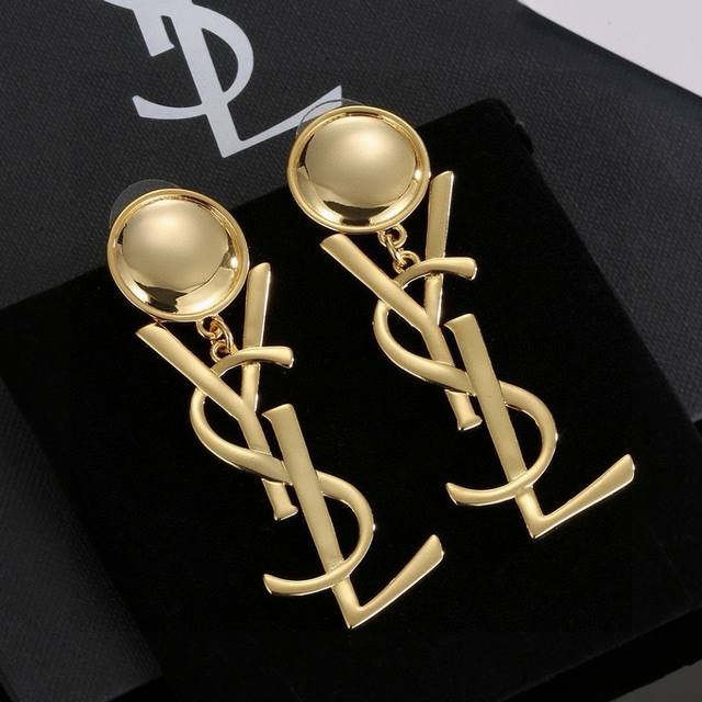 Ysl Saint Laurent earrings, original brass. Founded in 1961, Yves Saint Laurent'