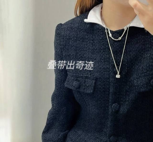 Chanel's popular small sugar cube necklace is a must-have! The black lettering p