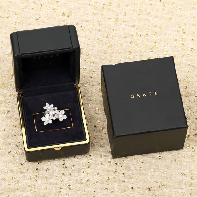 We offer the Graff Wild Flower ring, available for custom order in 18K gold and