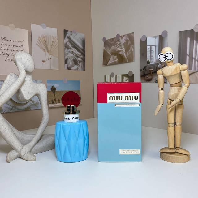 Miu Miu Eau de Parfum with Red Cap, Vintage Pleated Style. Fragrance Notes: Flor
