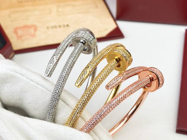 Cartier Juste Un Clou Half-Circle Classic Diamond Nail Bangle. Bold, free-spirit