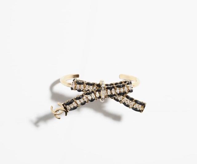 Chanel Heavy-Duty Lambskin Bow Marquise Bangle. The unique metallic texture crea