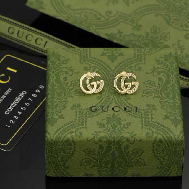 Gucci earrings, exquisitely crafted to the point of being breathtaking. Because