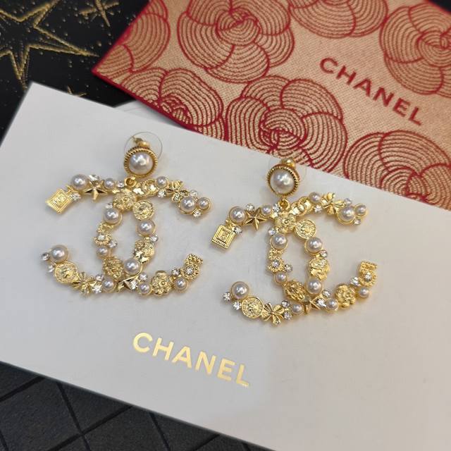 Selling like crazy! These are the latest Chanel mini perfume bottle earrings wit