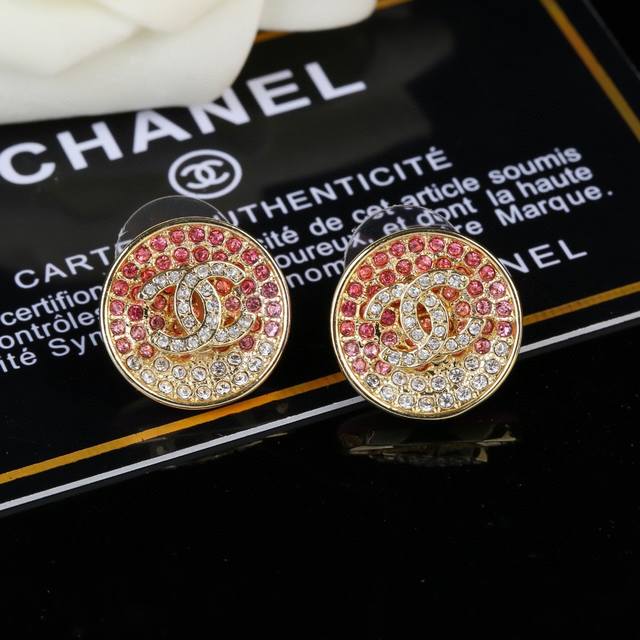Chanel's new pink gradient earrings, available now at boutiques. Double C stud e