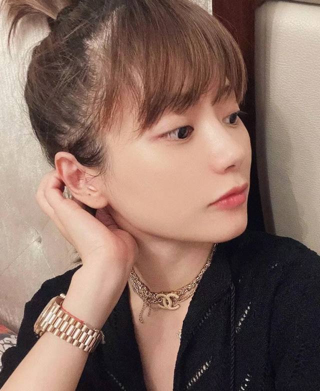 Chanel retro-style embossed tassel necklace This choker looks really good on It