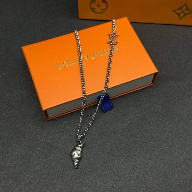 Lv Croissant Medium Charm Mo3127 This Lvcroissant Medium charm, designed by Crea