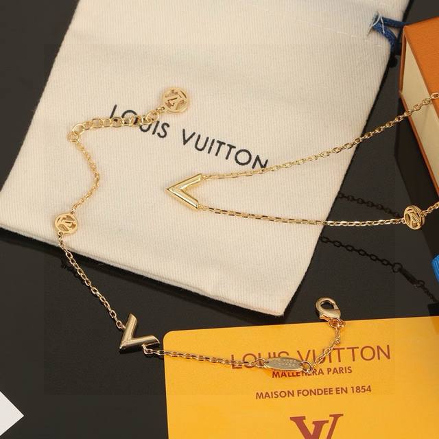 Exquisitely crafted Louis Vuitton monogram bracelet and necklace. The polished f