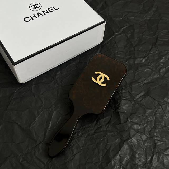 Chanel combs. Chanel's designs truly need no introduction; every single one is g