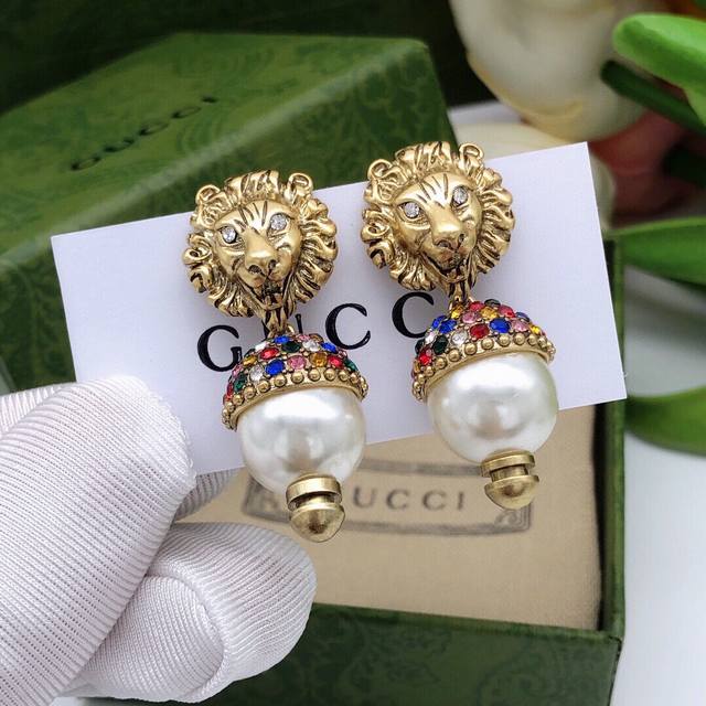 Item No. Ged0029 Gucci Lion Diamond Earrings. Cool lion design, antique bronze c