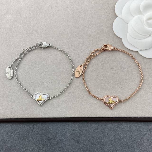Vs0525 Vivienn Westwood Saturn Heart Bracelet This stunning Saturn heart mother-