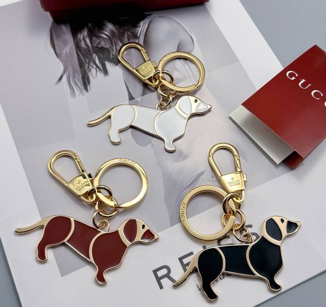 New Gucci puppy keychain charm, exquisitely crafted in three colors. Featuring a