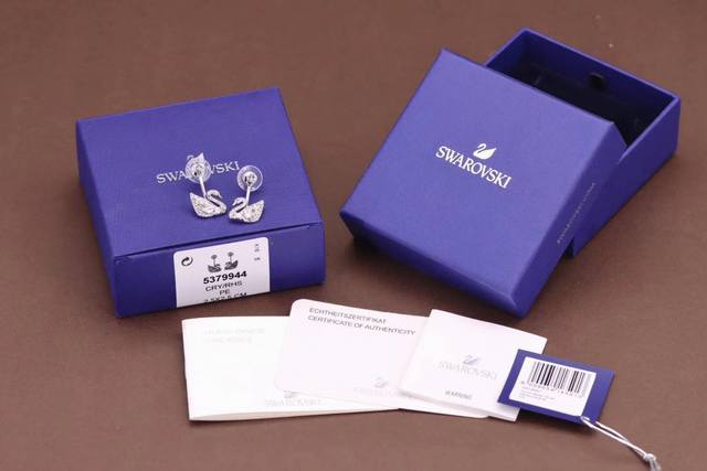 Swarovski Micro-paved Swan Drop Earrings These versatile and charming floral-sha