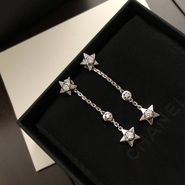 Exquisitely crafted new Chanel five-pointed star stud earrings. A unique design