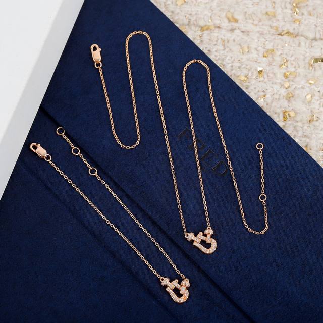 Various exquisitely crafted versions of Fendi necklaces with full diamond saddle