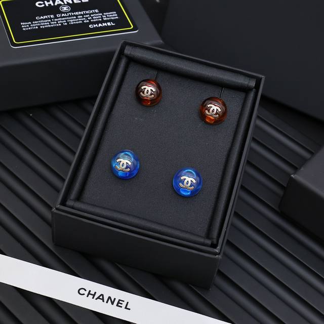 Chanel tortoiseshell and blue button earrings. Full of vintage charm.