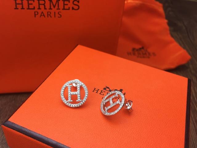 Hermes full-diamond round H logo stud earrings with a white gold plating finish,