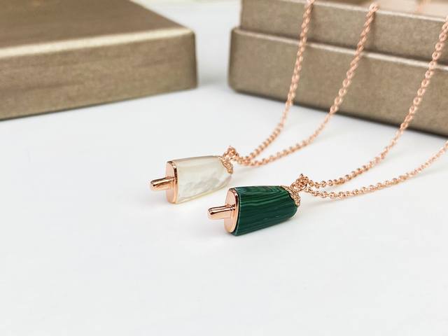 Bulgari Popsicle Necklace. The lifelike white mother-of-pearl and malachite are