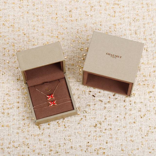 Necklace and Bracelet. We produce the Liens Cross Necklace Z 40. Look for the on