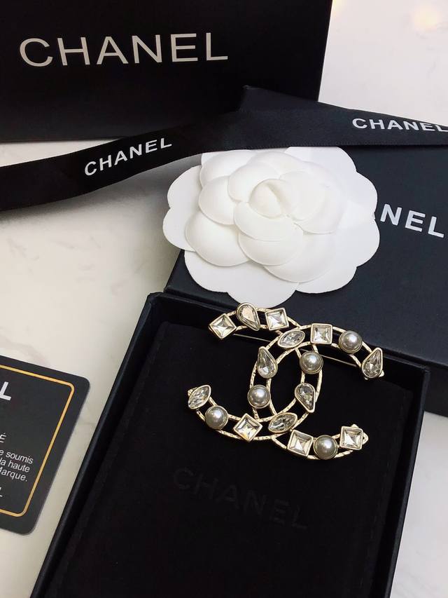 A batch of classic Chanel brooches, authentically detailed, new arrivals from th