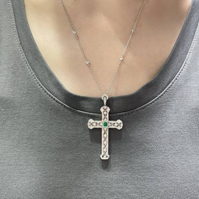 Colored Gemstone: Imported custom-made oversized cross necklace in V-gold. A mus