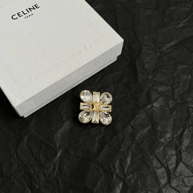 Celine brooches have always been a benchmark in minimalist fashion. Their bold d