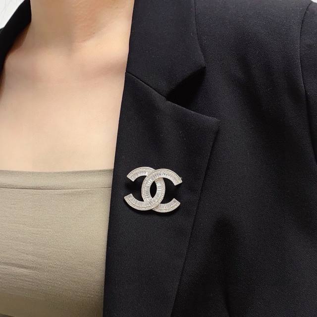 This latest high-quality silver Chanel brooch, fully rhinestoneed, is the perfec
